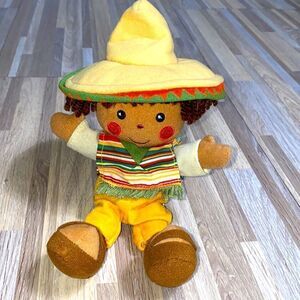 Disney plush it’s a small world doll Mexico Boy with poncho and sombrero euc
